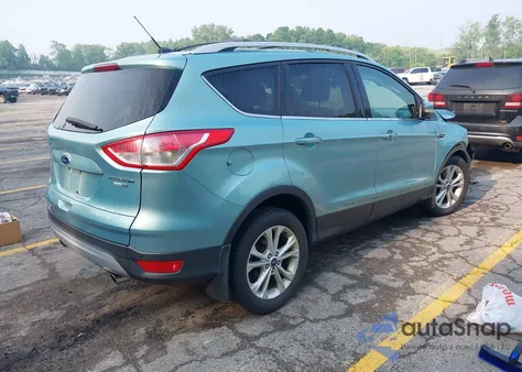 2013 Ford Escape Titanium z USA, uszkodzony, nr VIN 1FMCU9J99DUD63037